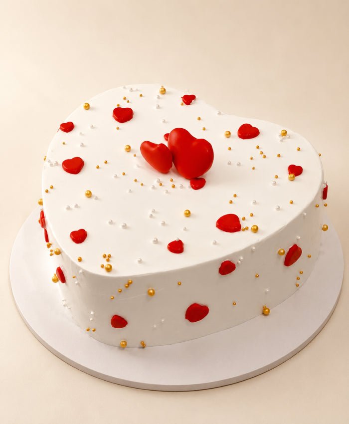 Romantic White Heart Cake with Red Hearts & Gold Pearls - Old School Truffle cake design